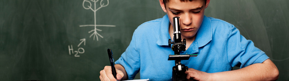 A student using a microscope